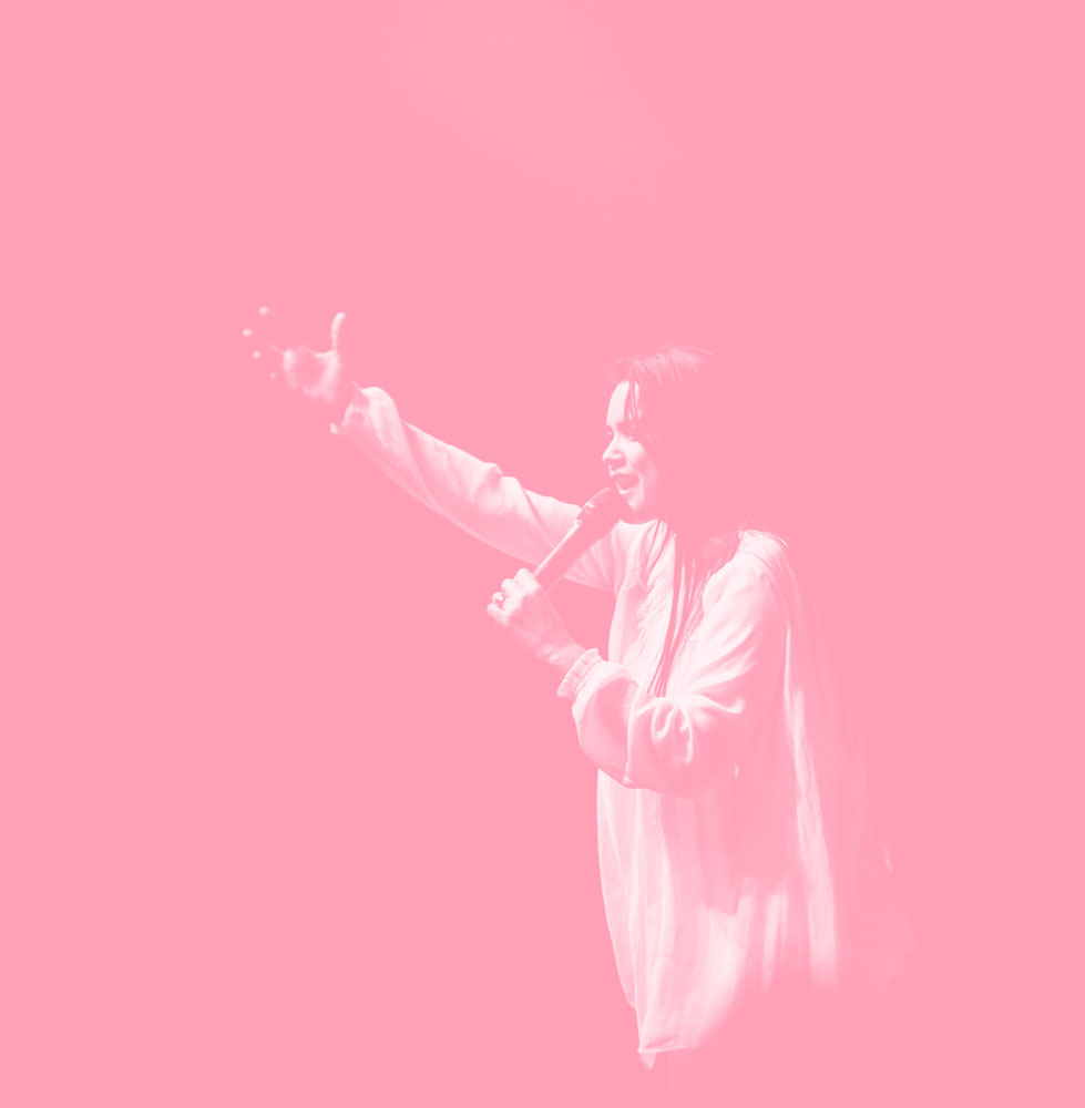 red tinted image of woman speaking into microphone
