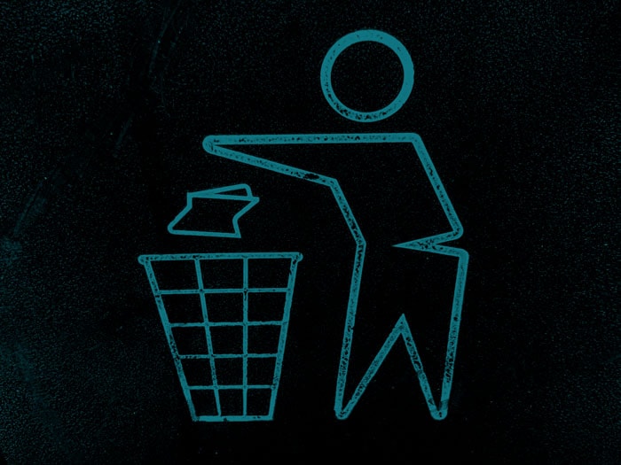 outline of someone throwing garbage in the trash
